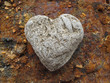 Single Heart Shaped Pebble On Rock