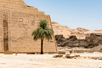 Wall Mural - Temple Medinet Habu Egypt Luxor of Ramesses III is an important New Kingdom period structure in the West Bank of Luxor