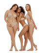 © New Africa - Group of women with different body types in underwear on white background