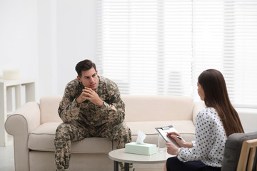 Poster - Psychotherapist working with male military officer in office