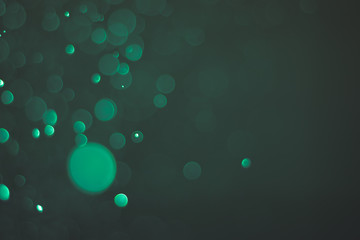 Abstract bokeh lights with light green background, beautiful bokeh from water droplets