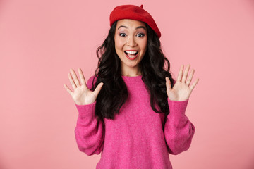 Sticker - Image of delighted asian girl laughing and gesturing with her hands