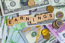 Word Text Earnings On The Money Banknotes Background