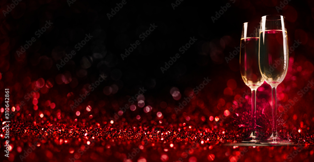Two champagne glasses on sparkling red bokeh background. Valentine's day dinner invitation. Christmas and new year holiday party. - obrazy, fototapety, plakaty 