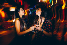 Two Girls Having Fun At The Club On New Year's Party