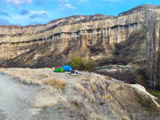 Wall Mural - Valley of old geological formations in the form of rocks and caves. A popular tourist destination. The place where they fly in balloons. Cappadocia. Turkey. November 5, 2019.