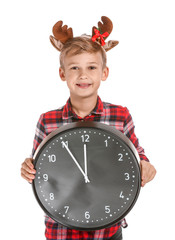 Sticker - Little boy with clock on white background. Christmas countdown concept