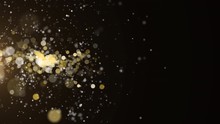 Gold Glitter Texture Sparkles Flying On Dark Background. 4k Glittering Footage. Abstract Animation Backdrop.