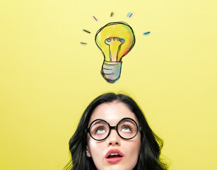 Sticker - One light bulb with young woman wearing eye glasses