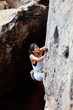 © Milles Studio/Stocksy - Focused woman training and climbing up