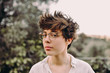 © Isaiah & Taylor Photography/Stocksy - Portrait of young woman with short cute hair