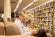 © carlosescotopdm - man reading in library