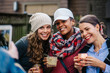 © CWP, LLC/Stocksy - Female friends posing for a smartphone picture