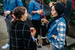 © CWP, LLC/Stocksy - Two Women Socializing During Backyard Party