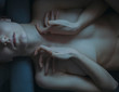 © Dmytro Bilous/Stocksy - hands of the girl close a breast