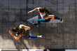 © Santi Nunez/Stocksy - Fitness women jogging outdoors in the city
