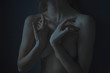 © Dmytro Bilous/Stocksy - hands of choreographer girl close their breasts