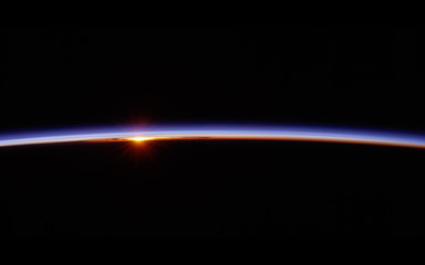 Wall Mural - observation of sunrise over the earth. view of planet earth from space.elements of this image furnis