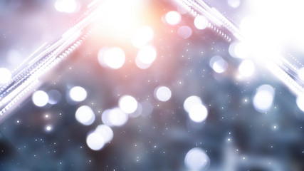 Blurred festive abstract background. Blurry bokeh lights, snowflakes, neon glow. Empty dark, winter scene with snowflakes, winter dark background. Abstract snow, blizzard. Abstract light, rays, snow. 