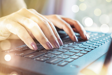 closeup business woman hand typing on computer laptop, technology background concept 