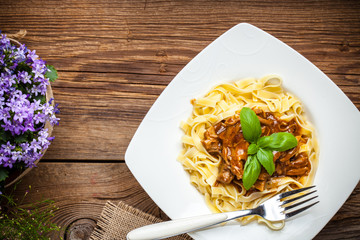 Canvas Print - Tagliatelle with dark sauce.