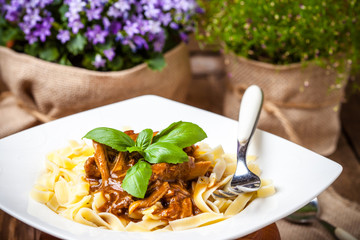 Canvas Print - Tagliatelle with dark sauce.