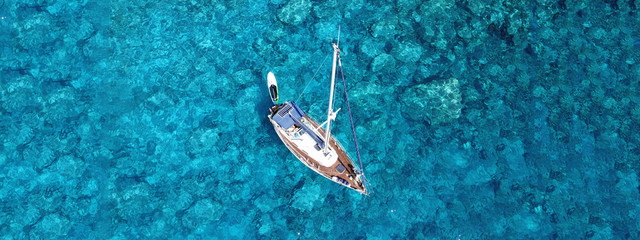 Wall Mural - Aerial drone photo of luxury sail boat docked in tropical exotic bay with turquoise crystal clear sea