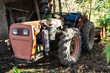 Very old rusty tractor parked and abandoned