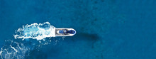 Aerial Drone Ultra Wide Top View Photo Of Jet Ski Water Craft Cruising In Deep Blue Mediterranean Sea