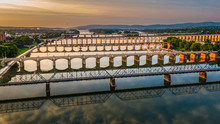 Many Bridges Over River In Sunset, Harrisburg, Pennsylvania, Susquehanna River Crossings Aerial View, Dramatic Evening Reflection In Water, Scenic American Vista