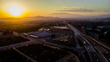 The Freeway During Sunset With Mountains In The Background In RIverside, California, USA