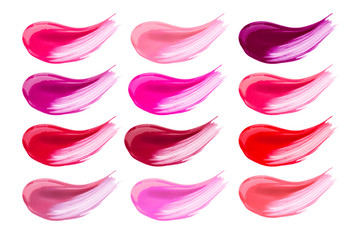 Lip gloss face make-up samples palette. Set of colorful cosmetic liquid lipgloss in different colour smudge smear strokes. Make up smears isolated on a white background. Lipstick colors