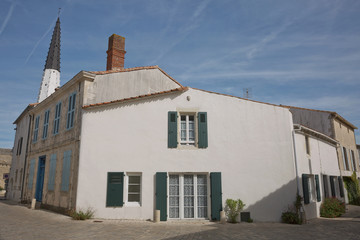 Church of Ars with black and white bell tower in the Ile de Re in Charente France