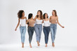 Leinwandbild Motiv Group of women with different body types on light background