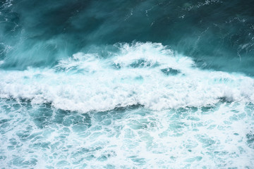 Wall Mural - View from above, stunning aerial view of some ocean waves that forms a natural texture. Indian Ocean, South Bali, Indonesia.