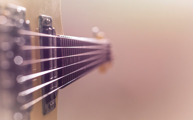 Electric guitar stratocaster sunburst closeup, macro abstract