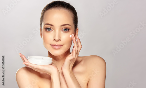 Beautiful young woman with ...