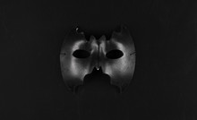 Black Abstract Bat Mask Isolated On Black Background