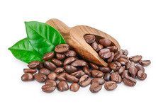 Heap Of Roasted Coffee Beans In Wooden Scoop With Leaves Isolated On White Background.
