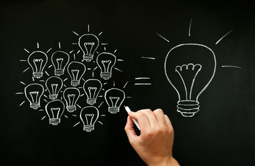 Wall Mural - Teamwork Developing Idea Light Bulbs Concept