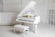 White Piano In A White Interior. Luxury Interior.