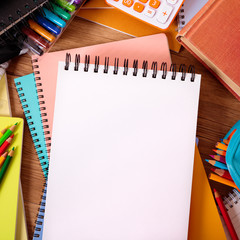 Canvas Print - Student desk with blank writing book, copy space