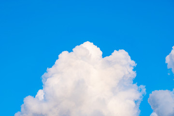 Wall Mural - Big white cloud in the blue sky.