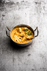 Wall Mural - Mushroom Paneer curry or sabzi, served in a bowl. selective focus