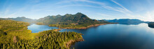 Beautiful Aerial Panoramic View Of Kennedy Lake During A Vibrant Sunny Day. Located On The West Coast Of Vancouver Island Near Tofino And Ucluelet, British Columbia, Canada.