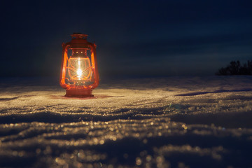 Lighted snow by an oil lamp