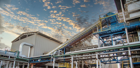 Canvas Print - Industrial sugar conveyor production line factory cane bagasse