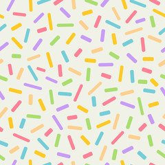 Seamless colourful sprinkles repeat pattern on a light background, birthday celebration theme