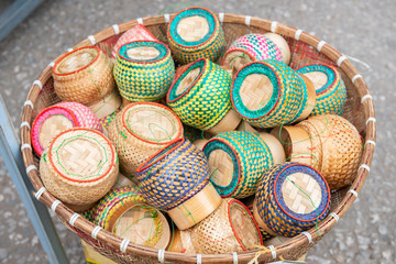 Group of traditional wooden bamboo using for contained hot sticky rice inside. It's very popular in local Thailand and Laos.