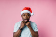 © liliyabatyrova - African american man wearing Santa hat